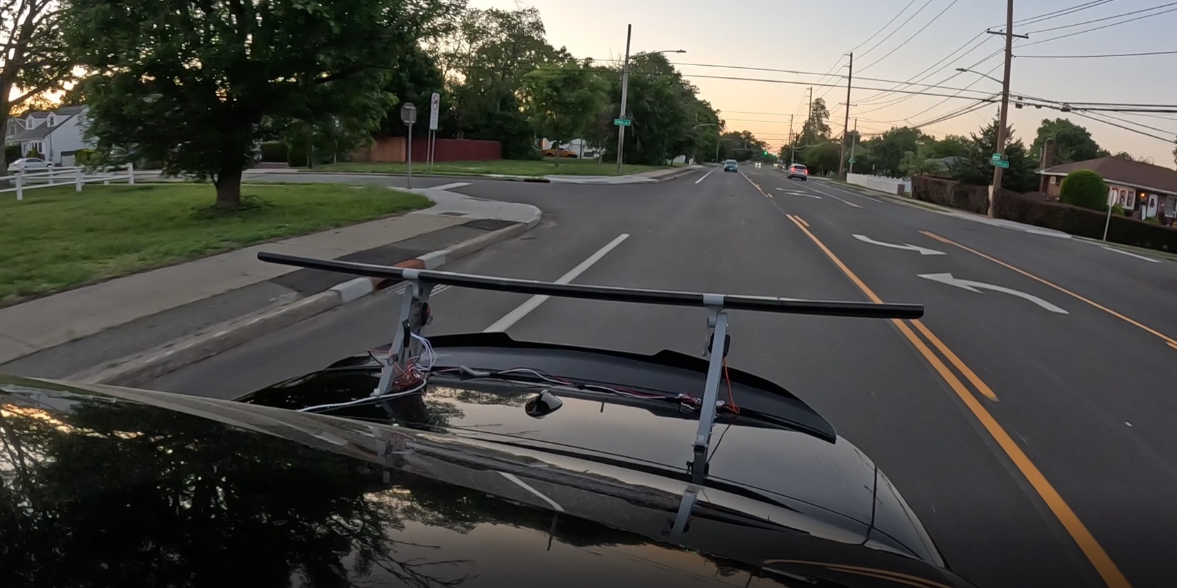 Driver's-eye GoPro view of the wing mounted on the trunk while driving